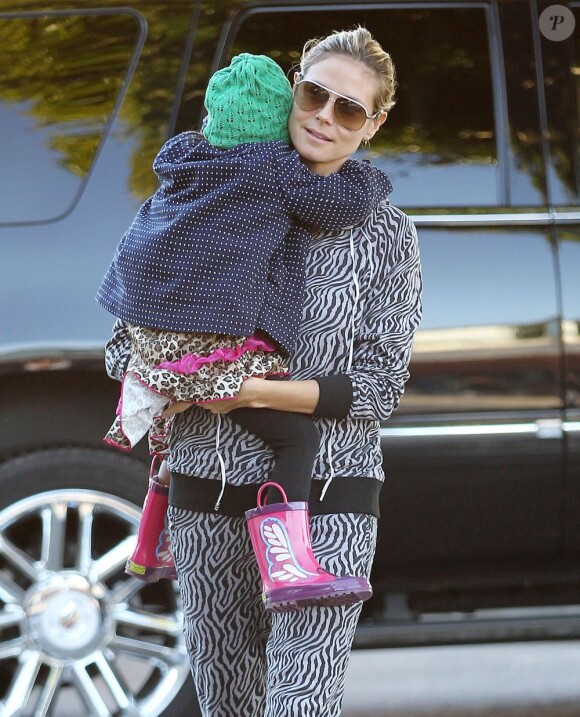 Heidi Klum, son amoureux Martin et sa petite fille Lou, à Brentwood, le 28 décembre 2012