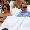 Tom Felton, héros de Harry Potter, profite de vacances à la plage à Miami avec sa petite amie, la ravissante Jade Olivia, le 29 décembre 2012