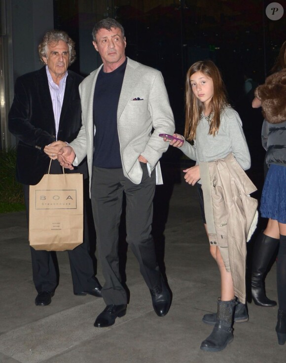 Sylvester Stallone, sa femme Jennifer Flavin, et leurs filles Sophia, Sistine et Scarlet sortent du restaurant Boa Steakhouse à West Hollywood. Le 5 janvier 2013.