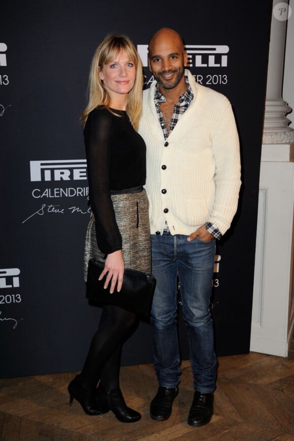 La pétillante Sandrine Corman en charmante compagnie à la soirée Pirelli organisée à Paris le 10 janvier 2013