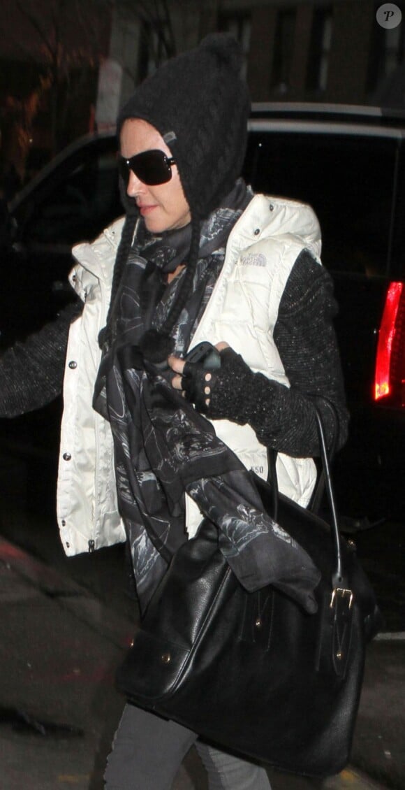 Madonna et ses enfants Rocco Ritchie, David et Mercy James à New York le 12 janvier 2013. Madonna est parée contre les températures les plus glaciales.