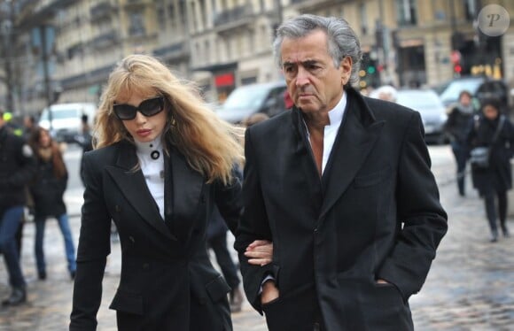 Arielle Dombasle et Bernard-Henri Levy aux obsèques d'Andrée Putman en l'Eglise Saint-Germain-des-Prés, le 23 janvier 2013. 


