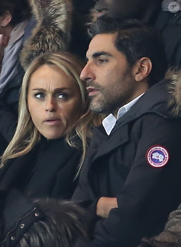 Cécile de Ménibus et Ary Abittan lors du match entre le Paris Saint-Germain et Toulouse le 23 janvier 2013 à Paris