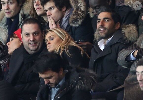 Cécile de Ménibus et Ary Abittan lors du match entre le Paris Saint-Germain et Toulouse le 23 janvier 2013 à Paris