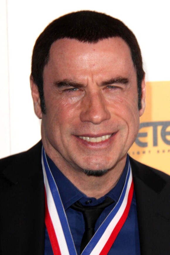 John Travolta à la 10e cérémonie annuelle Living Legends of Aviation Awards à Beverly Hills, le 18 janvier 2013.