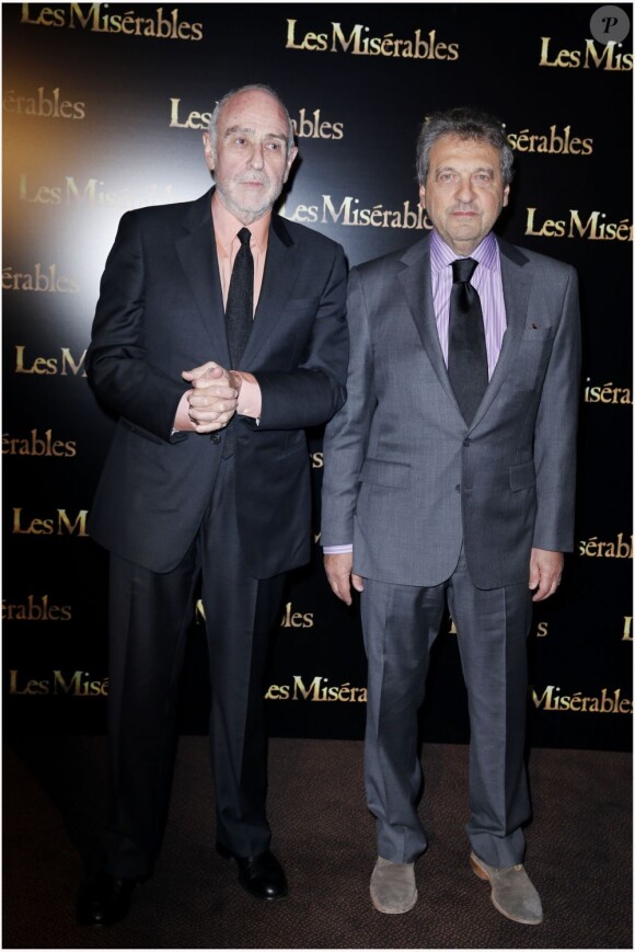 Claude-Michel Schönberg et son acolyte Alain Boublil lors de la première du film Les Misérables à Paris le 5 février 2013.