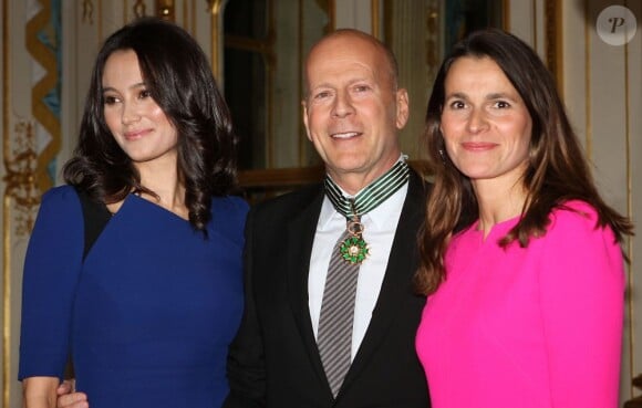 Bruce Willis, sa femme Emma Heming et Aurélie Filippetti au ministère de la Culture le 11 février 2013.