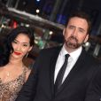 Nicolas Cage et sa femme Alice Kim lors de l'avant-première du film d'animation Les Croods à la 63e Berlinale, le 15 février 2013.