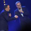 Nikos Aliagas et Laurent Ruquier sur la scène de Bobino pour la grande soirée humoristique "Europe 1 fait Bobino", le 18 février 2013