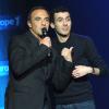 Nikos Aliagas et Mustapha El Atrassi sur la scène de Bobino pour la grande soirée humoristique "Europe 1 fait Bobino", le 18 février 2013