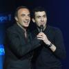 Nikos Aliagas et Mustapha El Atrassi sur la scène de Bobino pour la grande soirée humoristique "Europe 1 fait Bobino", le 18 février 2013