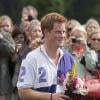 Le prince Harry lors d'un match de polo le 5 août 2012 à Cirencester Park.