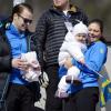 La princesse Victoria de Suède, son époux le prince Daniel et leur fillette la princesse Estelle lors des championnats du monde de ski a Val di Fiemme en Italie le 26 fevrier 2013