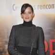 Marion Cotillard chic et parisienne pour l'avant-première du film Jappeloup au Grand Rex à Paris le 26 février 2013.