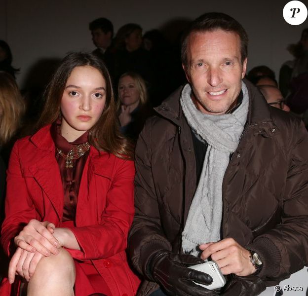Stéphane Rotenberg et sa fille assistent au défilé Vanessa Bruno automne-hiver 2013-2014 au Grand Palais. Paris, le 1er mars 2013.