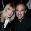 Nikos Aliagas et Tina Grigoriou assistent au défilé prêt-à-porter automne-hiver 2013 de Jean Paul Gaultier à la Salle Wagram. Paris, le 2 mars 2013.