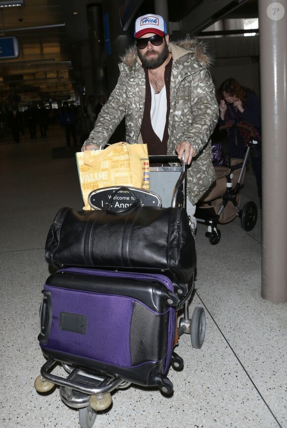 Le compagnon d'Adele, Simon Konecki, à l'aéroport de Los Angeles, le 2 mars 2013.