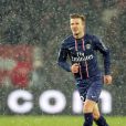  David Beckham sous la pluie fait ses grands débuts sous le maillot du Paris Saint-Germain face à l'Olympique de Marseille le 24 février 2013 à Paris au Parc des Princes 