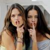 Alessandra Ambrosio et Adriana Lima complices au cours d'un shooting photo pour Victoria's Secret avec le photograpge Ben Watts à Santa Monica. Le 7 mars 2013.