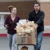 Britney Spears (accompagnée d'un garde du corps) faisant ses courses dans un supermarché de Los Angeles, le vendredi 8 mars 2013.