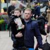 Wayne Rooney et son fils Kai dans les rues de Manchester le 14 mars 2013