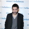 Manu Payet arrive à la première du film Amour & Turbulences au Publicis, Paris, le 18 mars 2013.
