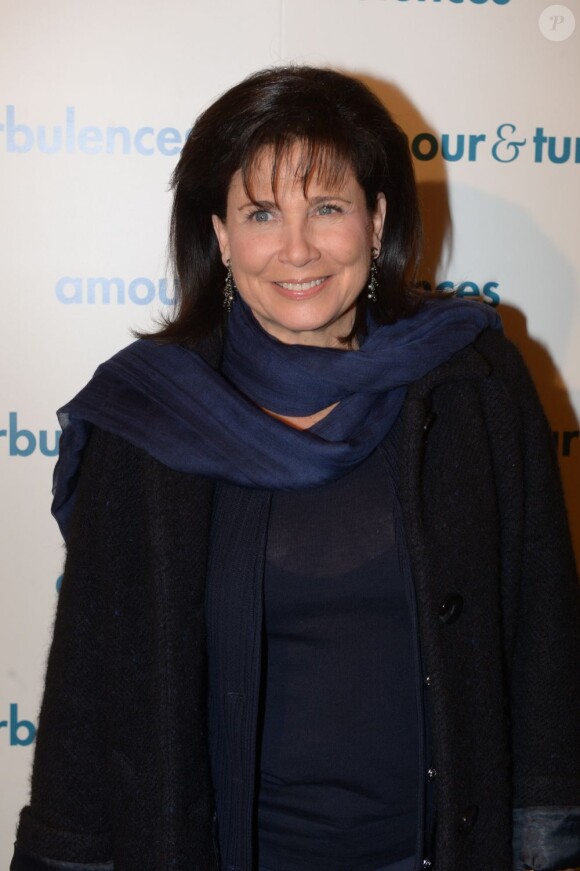 Exclusif - Anne Sinclair pendant le photocall à la première du film Amour & Turbulences, le 17 mars 2013.