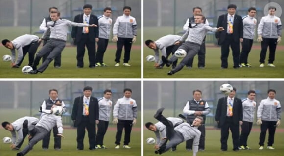 David Beckham chute en Chine en voulant frapper un coup franc devant de jeunes footballeur de Wuhan, le 23 mars 2013