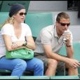 Kim Clijsters et son mari Brian Lynch aux internationaux de Roland Garros à Paris, le 25 mai 2010.