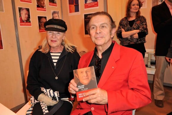 Roland Giraud et son épouse Maaike Jansen - 33eme édition du Salon Du Livre à Paris, le 23 mars 2013.