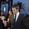Le prince Emmanuel Philibert de Savoie épaulait son épouse Clotilde Courau, venue présenter lors du 50e Mip TV, à Cannes le 8 avril 2013, la série La Source réalisée par Xavier Durringer.