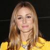 Olivia Palermo porte une robe Katie Ermilio (collection printemps-été 2013) accessoirisée d'une ceinture Zara, des souliers et une pochette Jimmy Choo lors de gala A Fool's Fete à New York. Le 9 avril 2013.