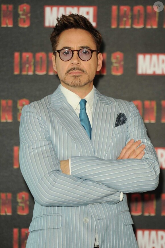 Robert Downey Jr. pendant le photocall du film Iron Man 3 à l'hotel Dorchester à Londres le 17 avril 2013.