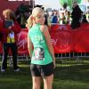 Katherine Jenkins courant avec une photo de son père, mort du cancer, au marathon de Londres le 21 avril 2013.
