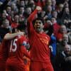 Luis Suarez exulte après avoir inscrit le second but égalisateur des Reds de Liverpool face à Chelsea, le 21 avril 2013 à Liverpool