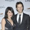 Romain Grosjean et sa femme Marion Jollès-Grosjean lors dudîner de Gala du 92ème Grand Prix d'Amérique au Grand Palais à Paris le 26 janvier