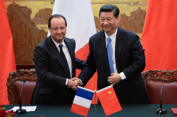 François Hollande et le président chinois Xi Jinping à Pékin, le 25 avril 2013.