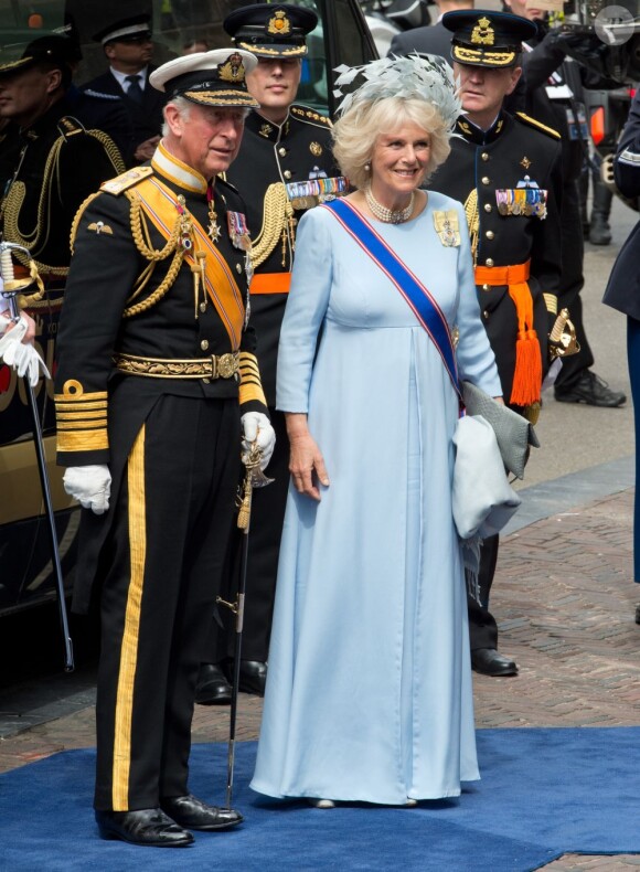 Le prince Charles et son épouse Camilla Parker Bowles à la prestation de serment du roi Willem-Alexander des Pays-Bas, le 30 avril 2013 à la Nouvelle Eglise (Nieuwe Kerk) d'Amsterdam.