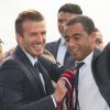 David Beckham et Lucas quittent le Parc des Princes pour fêter le titre de Champion de France au Trocadero à Paris le 13 mai 2013.