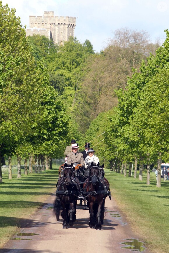 Le prince Philip, époux de la reine Elizabeth II, conduisant un attelage lors du Champagne Laurent Premier Meet of the British Driving Society, le 12 mai 2013, au dernier jour du Windsor Horse Show.