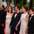 Frédéric Pierrot, Géraldine Pailhas, François Ozon, Marine Vacth et Fantin Ravat lors de la montée des marches de Jeune Et Jolie, premier film en compétition, au Palais Des Festivals de Cannes, le 16 mai 2013.