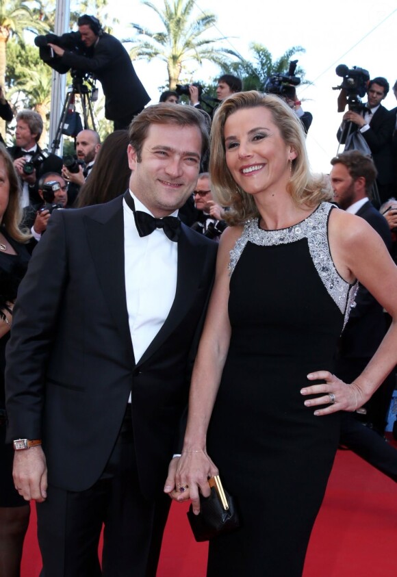 La journaliste Laurence Ferrari et son mari Renaud Capuçon à la montée des marches du film Le Passé, lors du 66e Festival du film de Cannes, le 17 mai 2013.