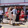 Pierre Casiraghi et sa compagne Beatrice Borromeo font une halte devant les stands de la Scuderia Ferrari avant le Grand Prix de F1 de Monaco le 26 mai 2013