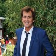 Max Guazzini dans les allées du Village de Roland-Garros le 27 mai 2013 lors du second jour des Internationaux de France