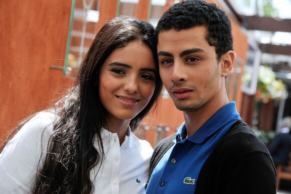 Hafzia Herzi et son frère dans les allées du Village de Roland-Garros le 27 mai 2013 lors du second jour des Internationaux de France