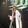 Rihanna, stylée dans un manteau Miu Miu, un top Balmain, un legging Azzedine Alaïa et des bottes Gianvito Rossi lors de son concert à Rabat. Le 24 mai 2013.