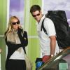 Kristin Cavallari, enceinte, avec son compagnon Jay Cutler à l'aéroport de Los Angeles, le 13 mars 2012.