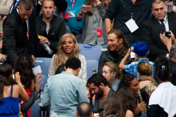 David et Cathy Guetta lors du concert de Rihanna au Stade de France. Pas moins de 80 000 personnes ont assisté à ce concert exceptionnel à Paris, le 8 juin 2013