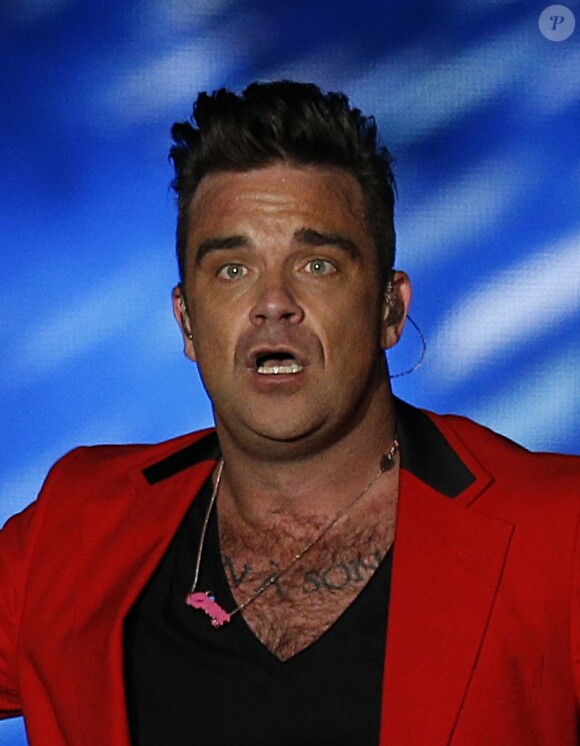 Robbie Williams lors du Summertime Ball organisé par Capital FM au stade de Wembley à Londres le 9 juin 2013.