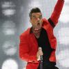 Le chanteur Robbie Williams lors du Summertime Ball organisé par Capital FM au stade de Wembley à Londres le 9 juin 2013.